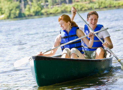 a couple is enjoy a canoe ride