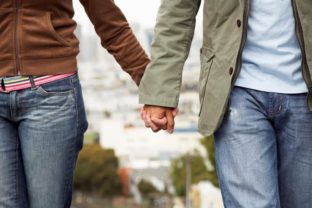 couple walking hand in hand