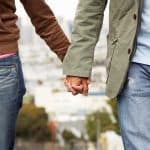 couple walking hand in hand