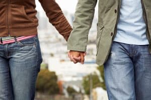 couple walking hand in hand