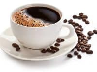 Coffee cup and beans