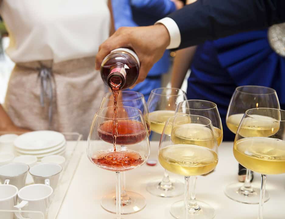 Pouring wine for tasting photo by Max Pixel (CC0 public domain)