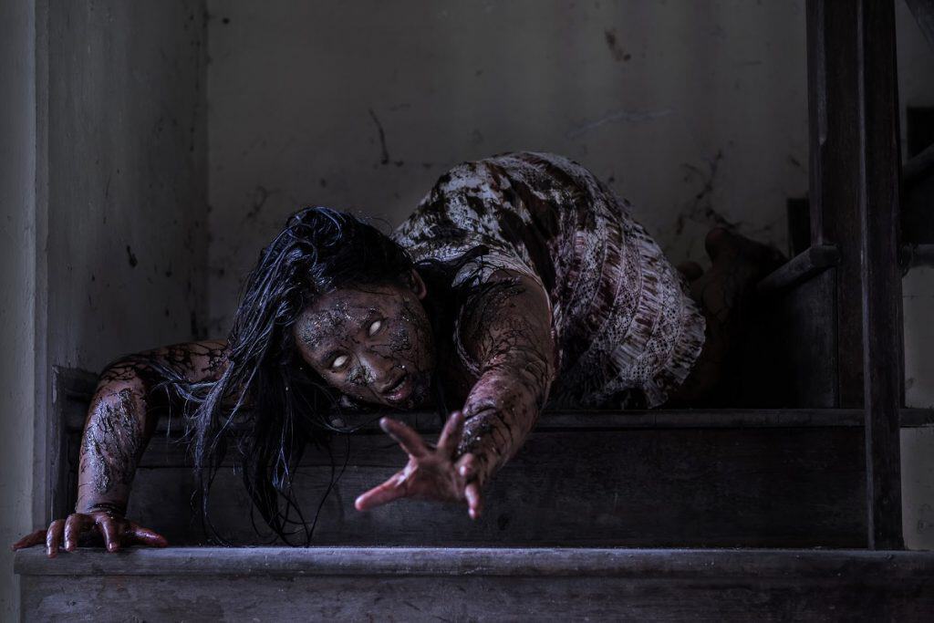 Zombie girl in haunted house