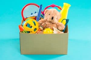 Box of toys for consignment sales photo by makidotvn - DepositPhotos.com