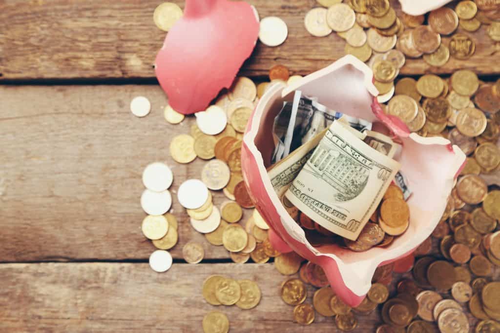 Broken piggy bank photo by DepositPhotos.com