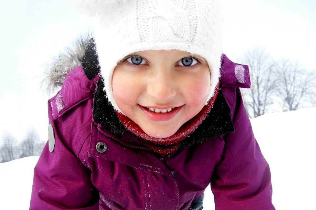 Happy young girl in winter - DepositPhotos.com