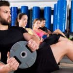 Abdominal plate training core group at gym - DepositPhotos.com