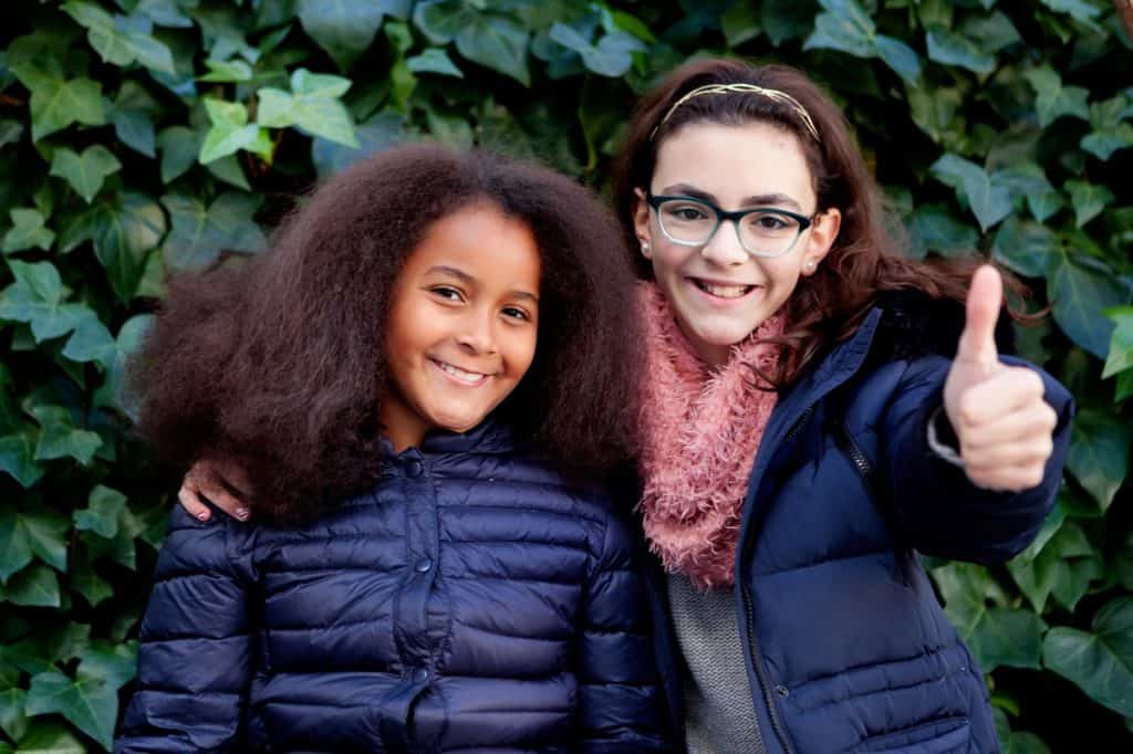 Young girls in winter coats