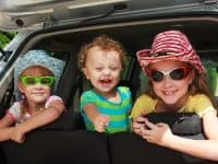 children on a summer famiuly road trip