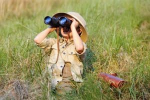 Explorer kid with binoculars