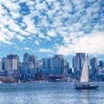 Sailboat against the Seattle skyline photo by cascoly - DepositPhotos.com