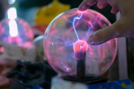 Plasma ball at technology exhibition photo by Zyabich - DepositPhotos.com