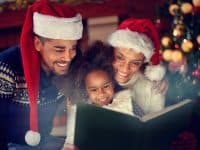 Family reading Christmas book together