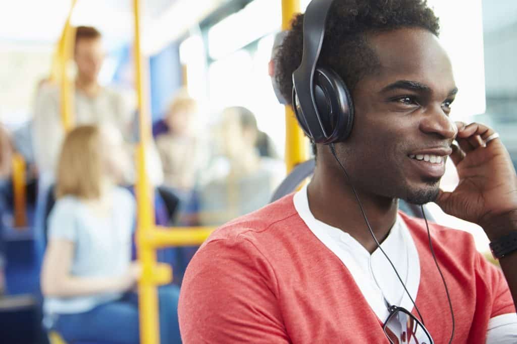Listening to podcasts on the bus