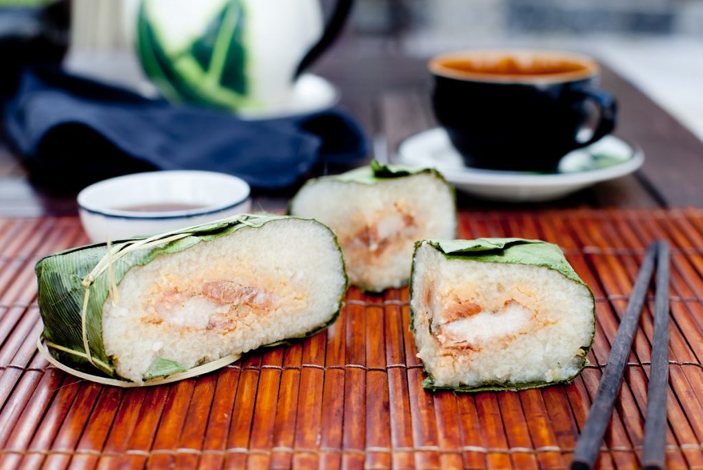 Banh chung (sticky rice cake), traditional Vietnamese food for Lunar New Year - DepositPhotos.com
