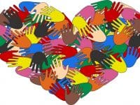 Depositphotos_8465575_l-2015 many hands on a heart