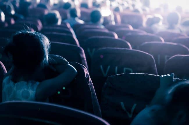 audience watching a film in a movie theater