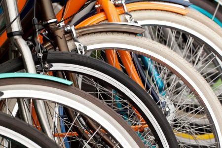 row of bicycle wheels