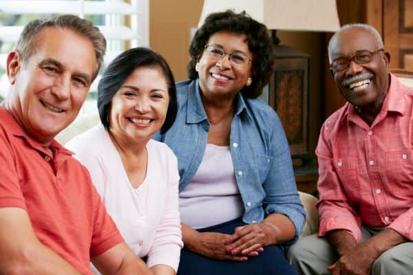 Group of senior citizens socializing together