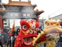 Lion dancers at Historic Chinatown Gate in Seattle, WA for Chinese New Year 2011 Photo by Joe Mabel (CC3)
