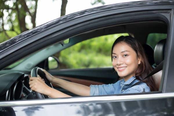 Woman in her car