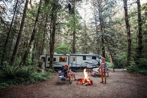 RVshare family around campfire