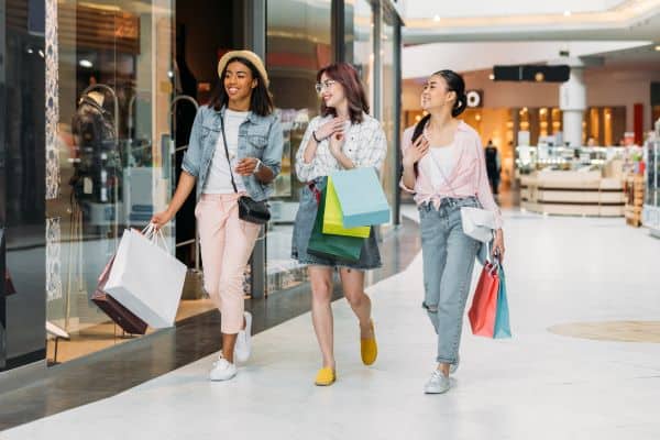 young women shopping at an indoor shopping mall