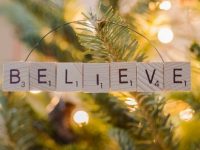 Lighted tree with "believe" in scrabble tiles