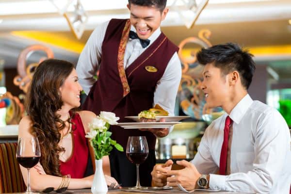 couple enjoying dinner at a restaurant