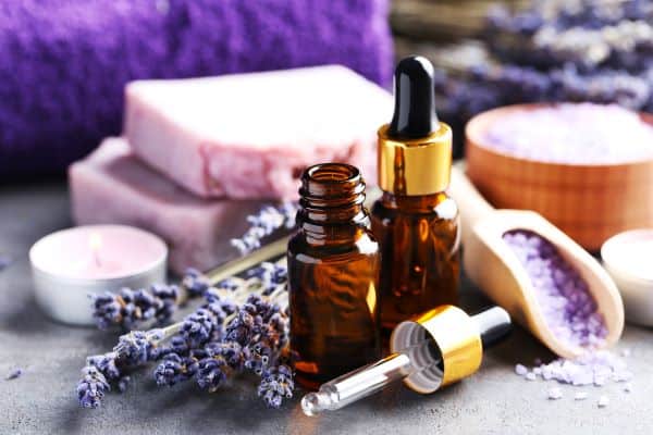 lavender products: candle, soap, bath salts, essential oil