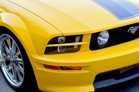 yellow ford mustang car front end