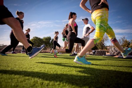 group of people in outdoor exercise class