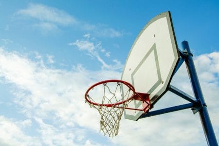 basketball hoop outdoors under blue sky