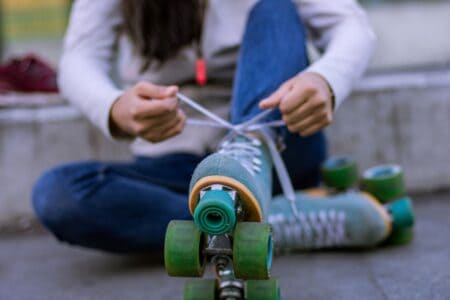 someone putting on roller skates