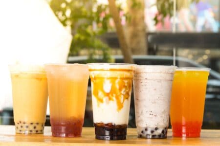 lineup of assorted bubble tea on a counter