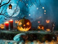 Halloween pumpkins in a spooky forest photo by Kesu01 - DepositPhotos.com